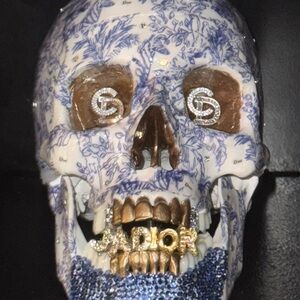 Intricate Blue and Brown Ceramic Skull Art